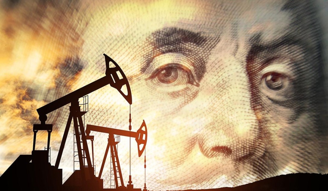 Oil rigs with financial backdrop